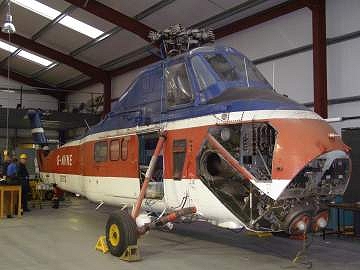 G-AVNE with debris filter, nose cone and engine access panels removed.