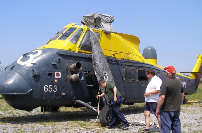Westland Wessex HAS.3, XM328, being prepared for the move, from open air storage, into the Main Display Hangar