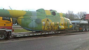 ex-Polish Air Force Mi-8P, 618, at a truckstop, in the Netherlands, en route to the UK