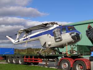 XL829 arrives at The Museum on a low-loader.